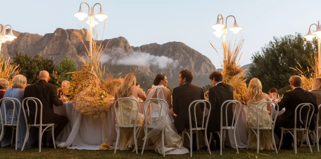 Professional event coordinator reviewing wedding timeline at a Cape Town venue